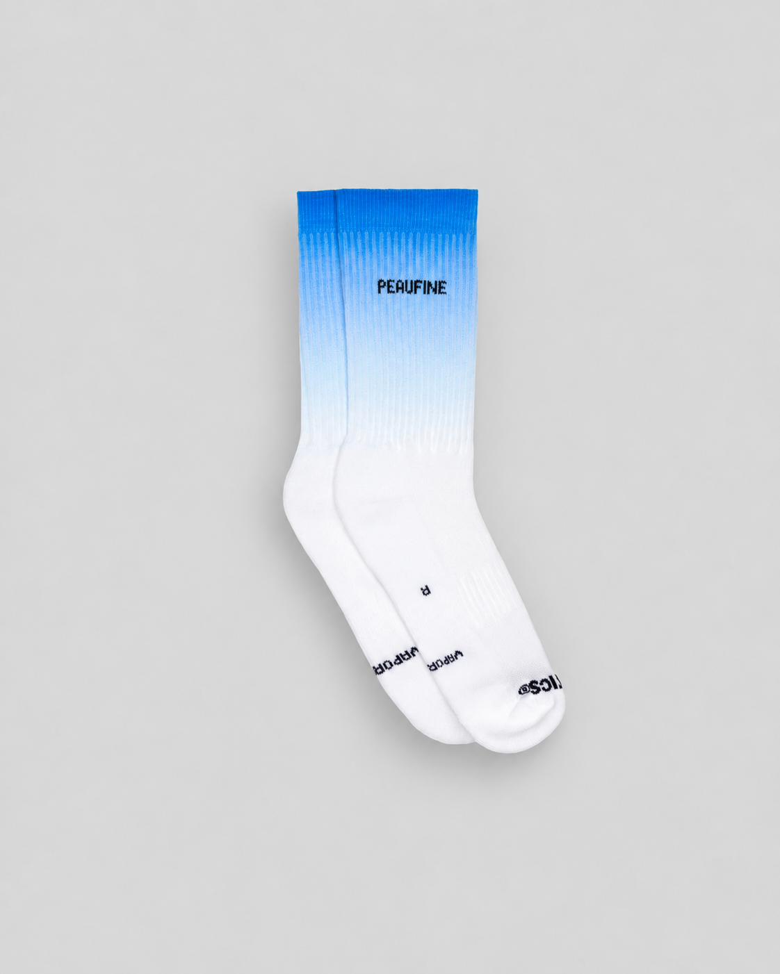 Chaussettes Peaufine Vaporfeel bicolores bleu et blanc sur fond gris